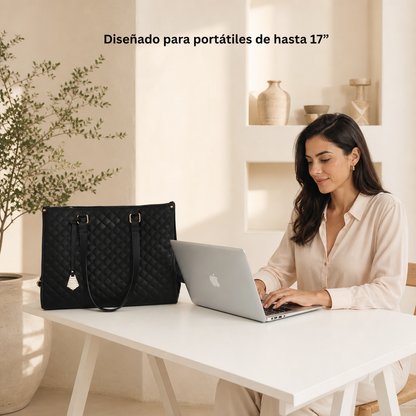 Bolso termo Babarino con portátil en oficina
